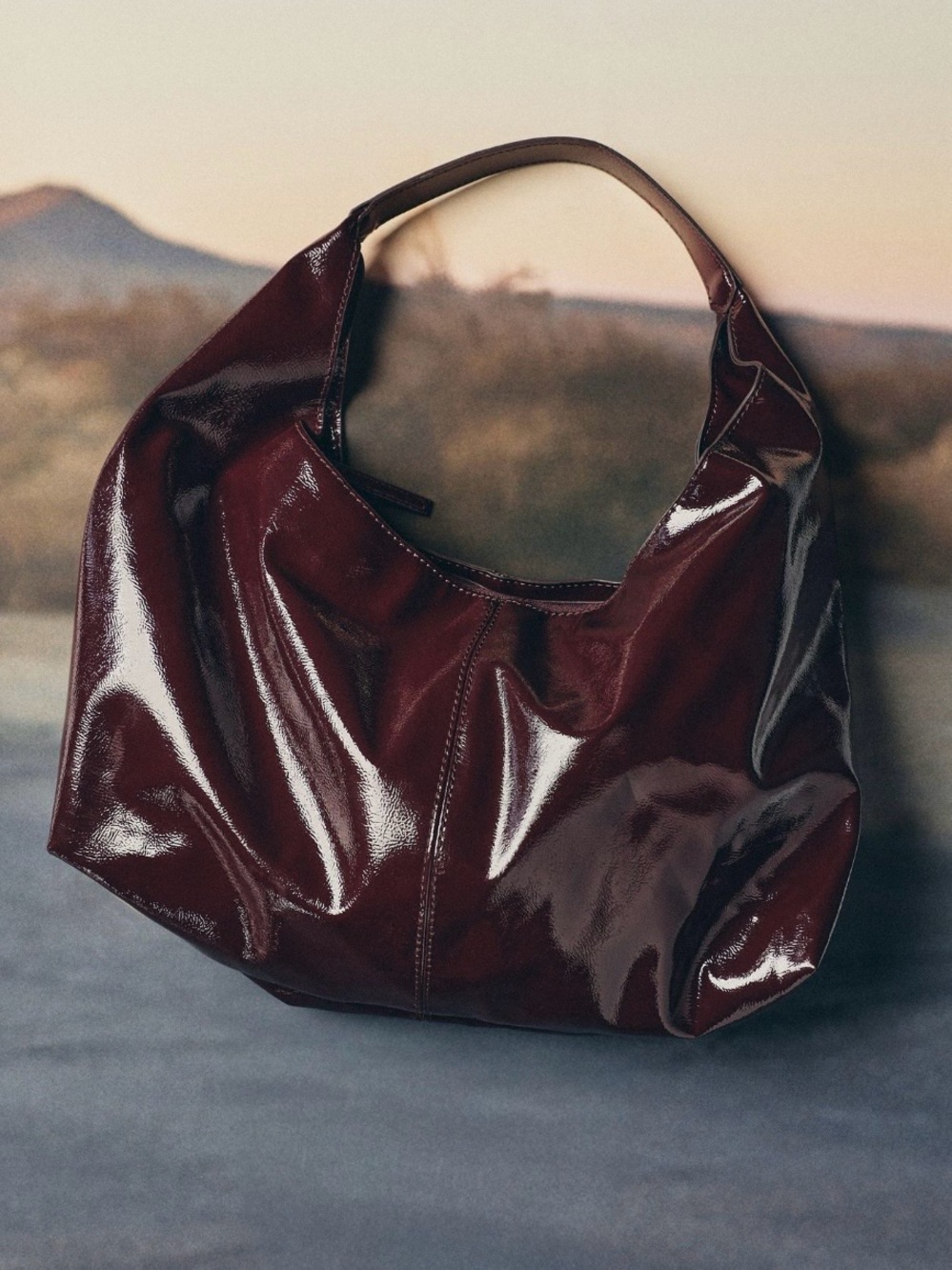 NWT Anthropologie Faux Patent Leather Bag in color wine